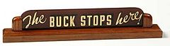 Sign from the desk of Harry Truman saying the buck stops here