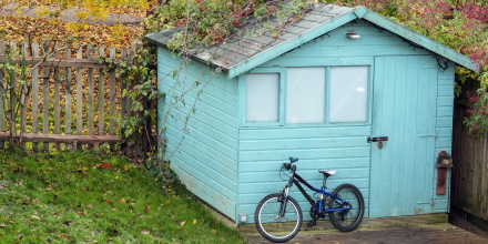 bike in front of a shed