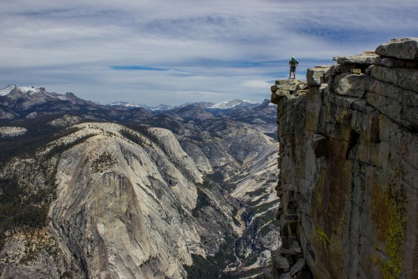 man overlooking mountains