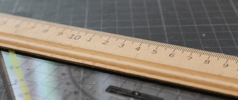 ruler and protractor on grid paper